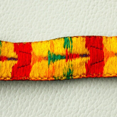 Blue Fabric Trim With Green, Yellow, Orange And Red Thread Embroidery